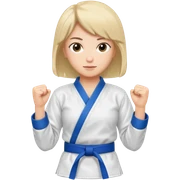 A woman in a karate uniform with a blue belt sticker
