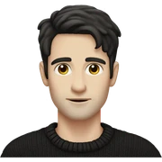 pale man with dark hair and stubble wearing black boho jumper sticker