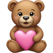 A  light brown teddy holding a pink heart sticker