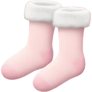a pair of light pink christmas socks with fur sticker