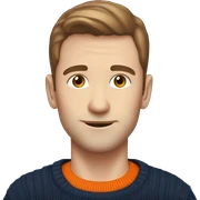 pale man with brown hair and stubble wearing navy and  orange jumper sticker