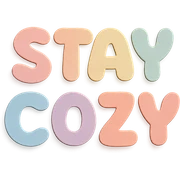 Cute kawaii style "Stay Cozy" in soft pastel rainbow rounded bubble font, no border, transparent background, paper craft style sticker
