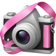 camera with a pink ribbon sticker