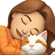 White girl brown hair sleeping with orange kitty sticker