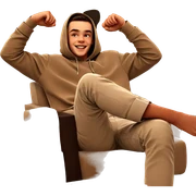 smiling boy sitting indoors sticker