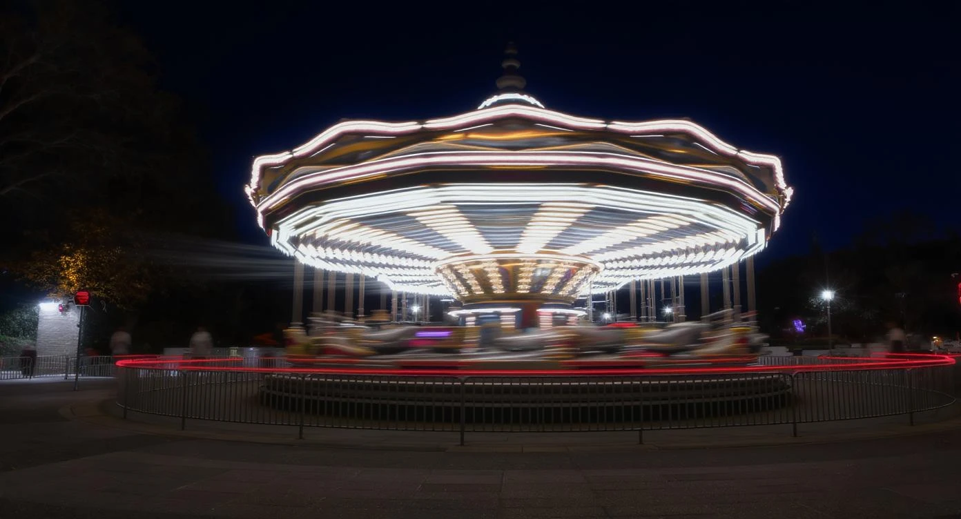 long exposure photo, a moving carousel at night emoji