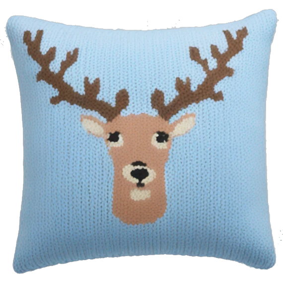 pastel blue knitted pillow with deer print emoji
