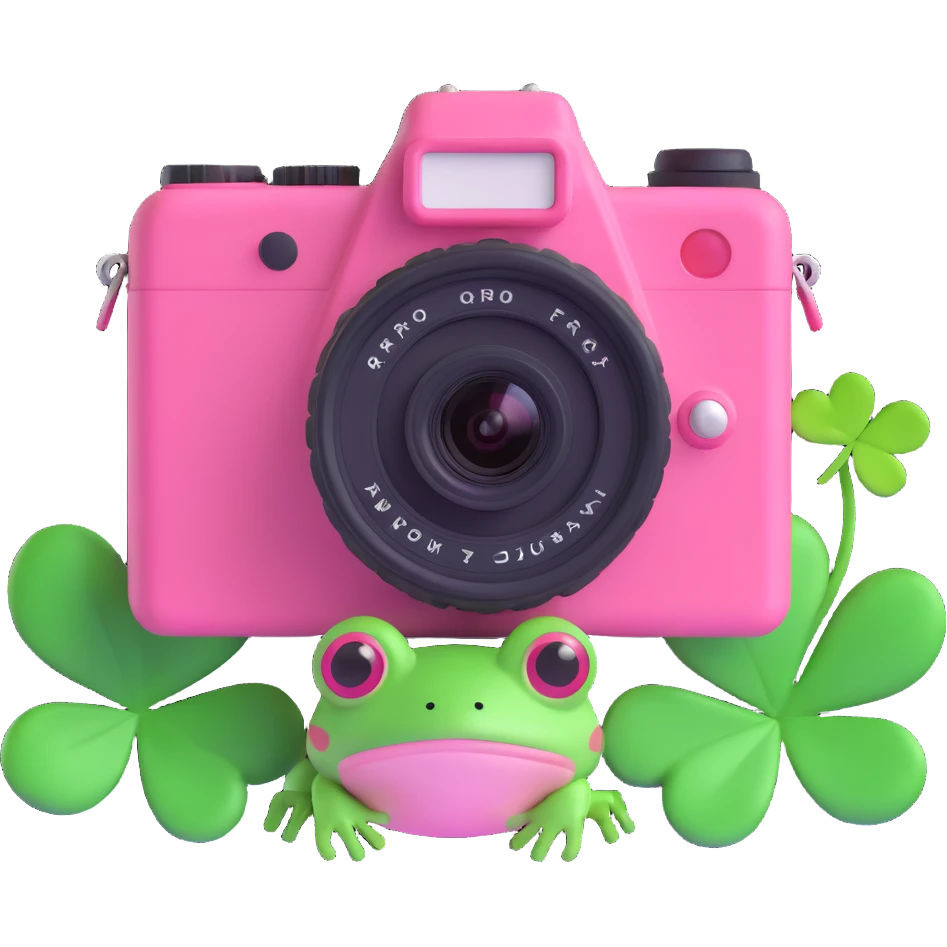 A vibrant pink camera with a green frog on the screen and green clovers around emoji