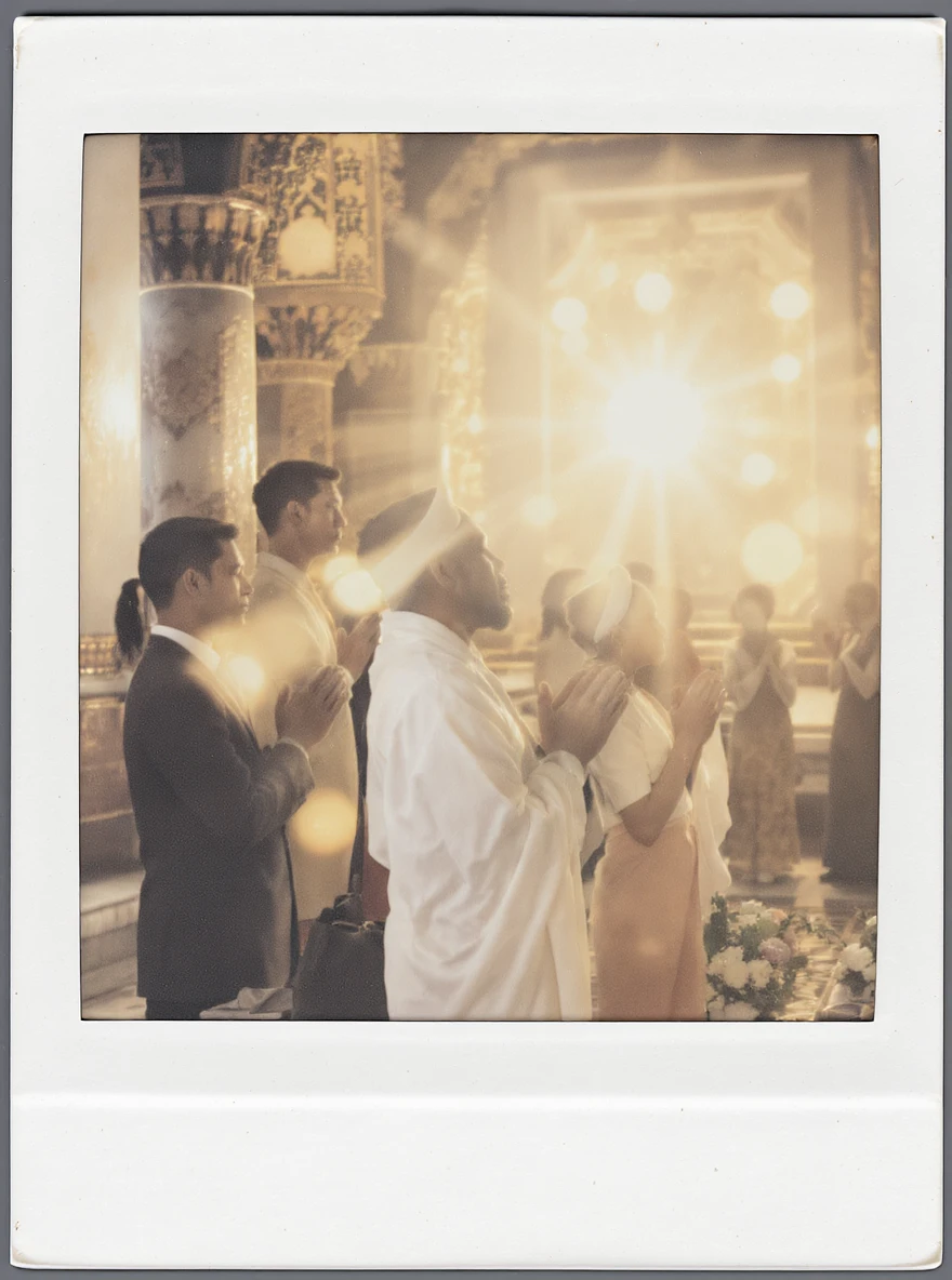 people praying in a Buddhist temple emoji