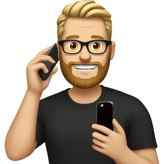 White man, 
wearing black circle glasses, smiling, straight hair with a high comb to the brown side, beard, holding a cell phone next to his face, black t-shirt with a pineapple emoji