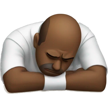 man slumped at work desk looking frustrated emoji
