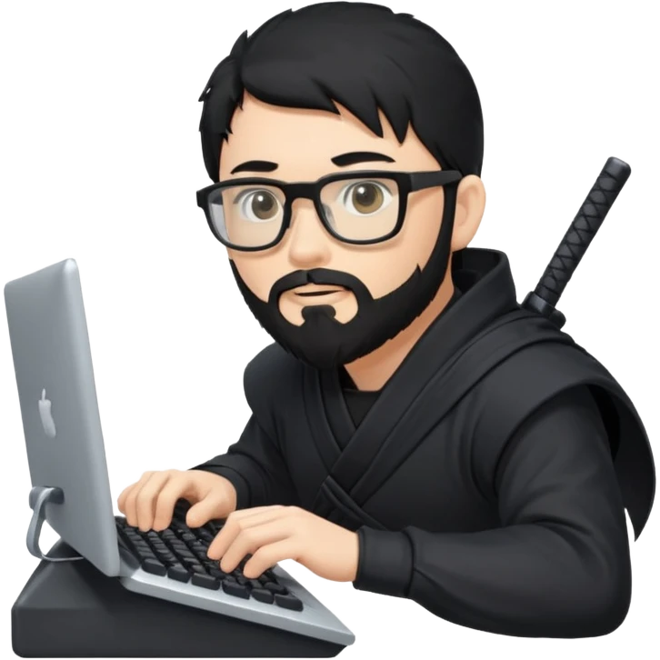 Man with black hair and beard wearing glasses in a ninja costume typing on a computer keyboard emoji