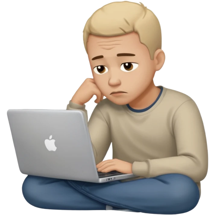 man sitting with laptop, looking sad emoji