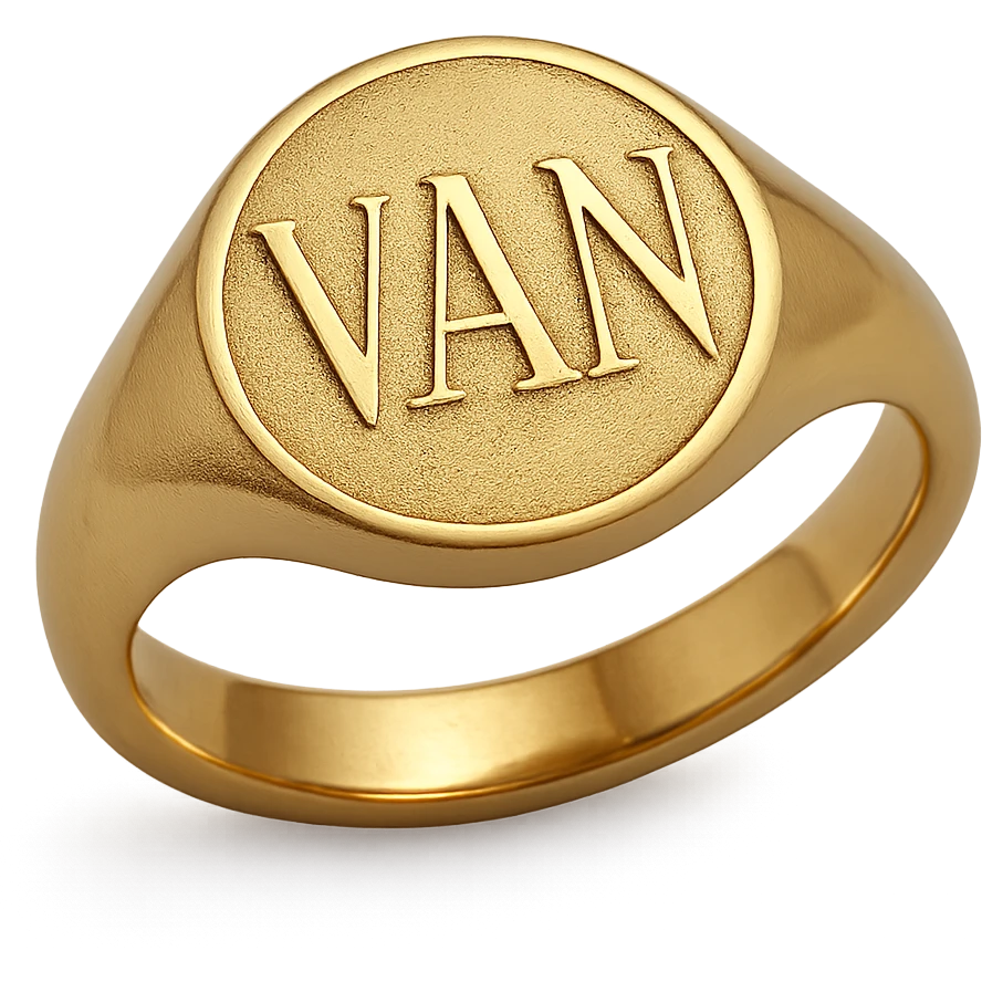 a gold ring with the letters V, A, and N engraved emoji