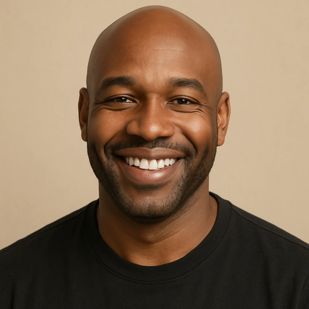 portrait of a bald black man smiling, minimal background emoji