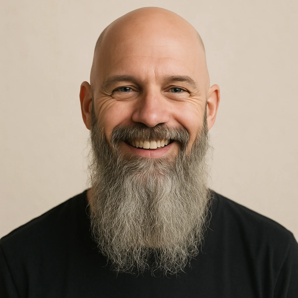 a bald man with a long grey beard, smiling, minimal background emoji