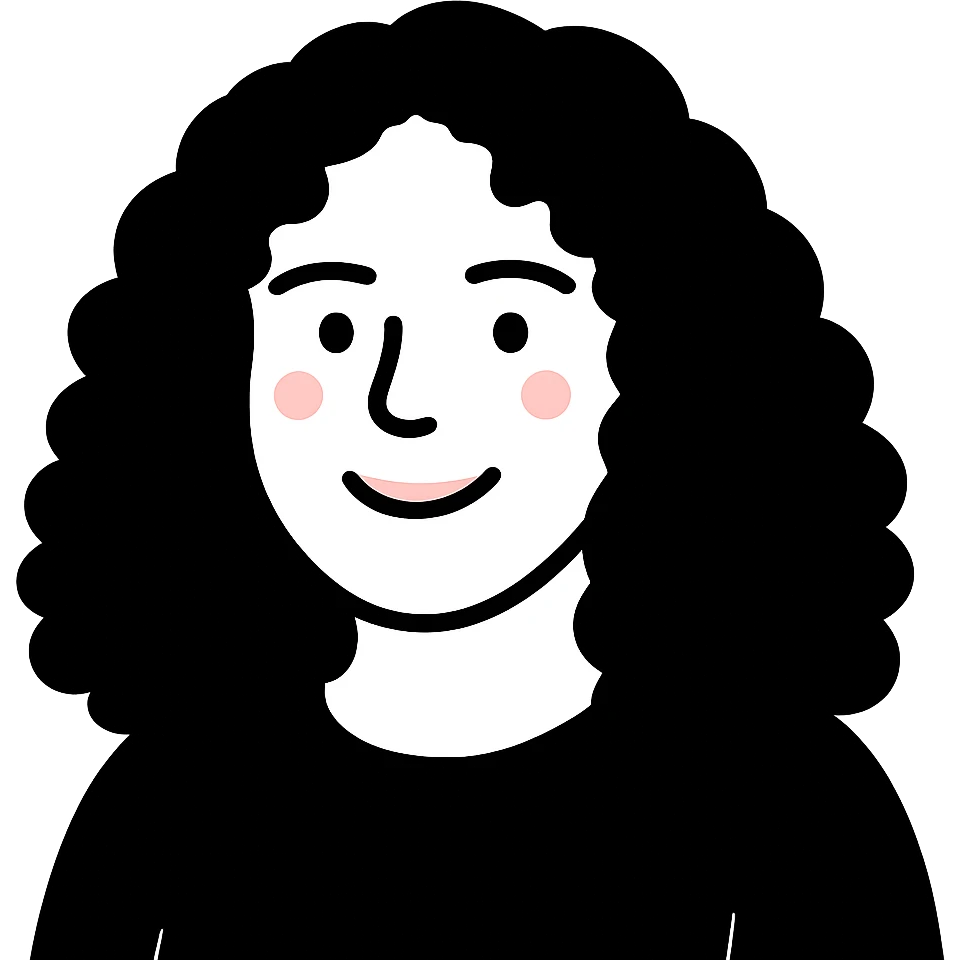 A cheerful young woman with curly hair, soft features, and a warm smile, facing forward with a friendly expression emoji