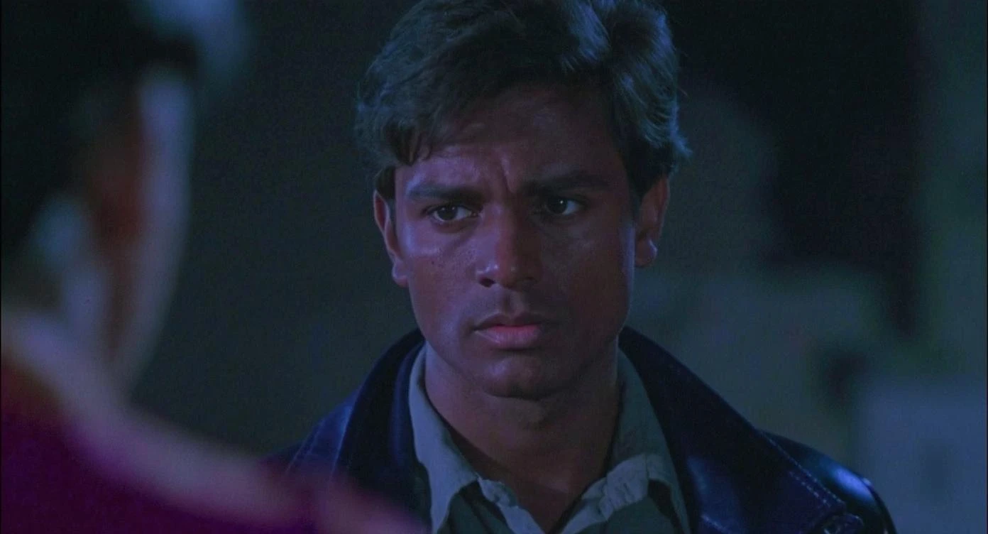 A cinematic screengrab from 1990 Indian Bollywood film called 'Batman', Sony Alpha a7 III camera, colorful  emoji
