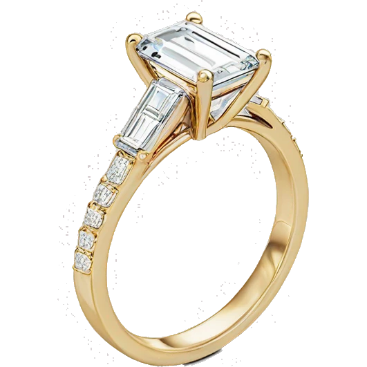 gold emerald cut engagement ring with side stones and thin band emoji