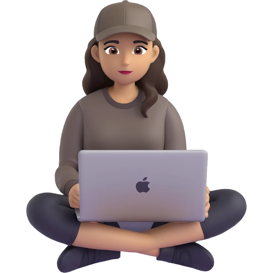A professional 3D avatar of a young woman with olive skin and long, dark brown hair, wearing a dark, long-sleeved dark taupe shirt and a black baseball cap. She's sitting at a sleek wooden desk, typing on a silver MacBook. emoji