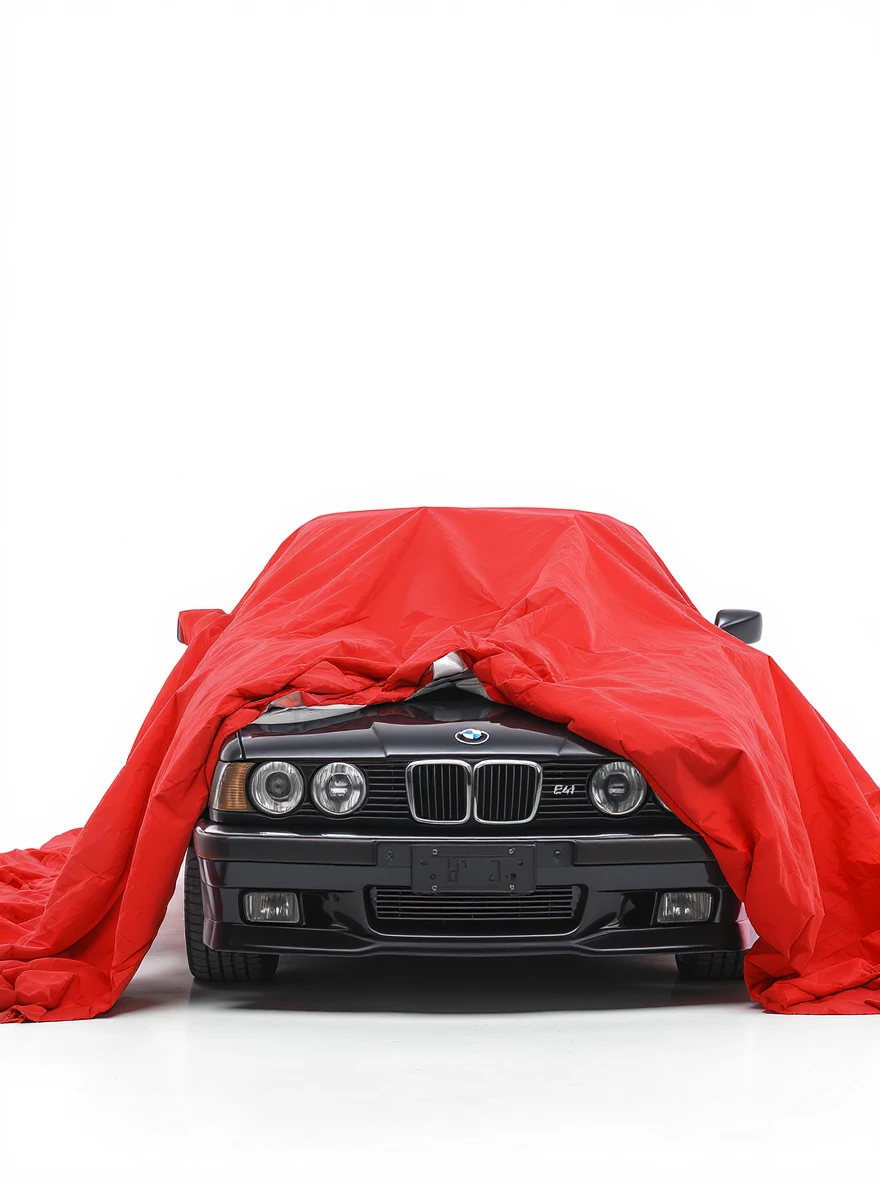 studio photo on a pure white background old black BMW E34 car is visible from under a red tent cover emoji