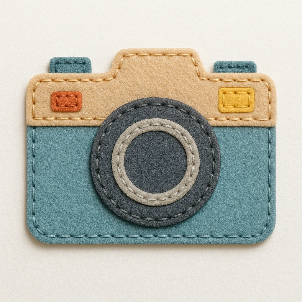 a camera, felt patch style, textured and fabric-like emoji