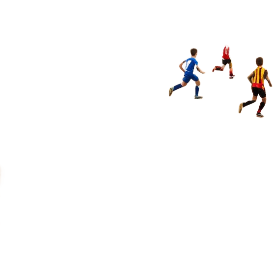 A mini-football match in an indoor sports hall with wooden flooring and clear field markings. The scene shows a vibrant game in action, with players positioned on the court, the goalposts visible, and the atmosphere filled with energy and focus. emoji