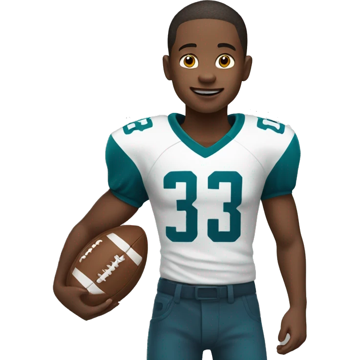 little boy paying football emoji