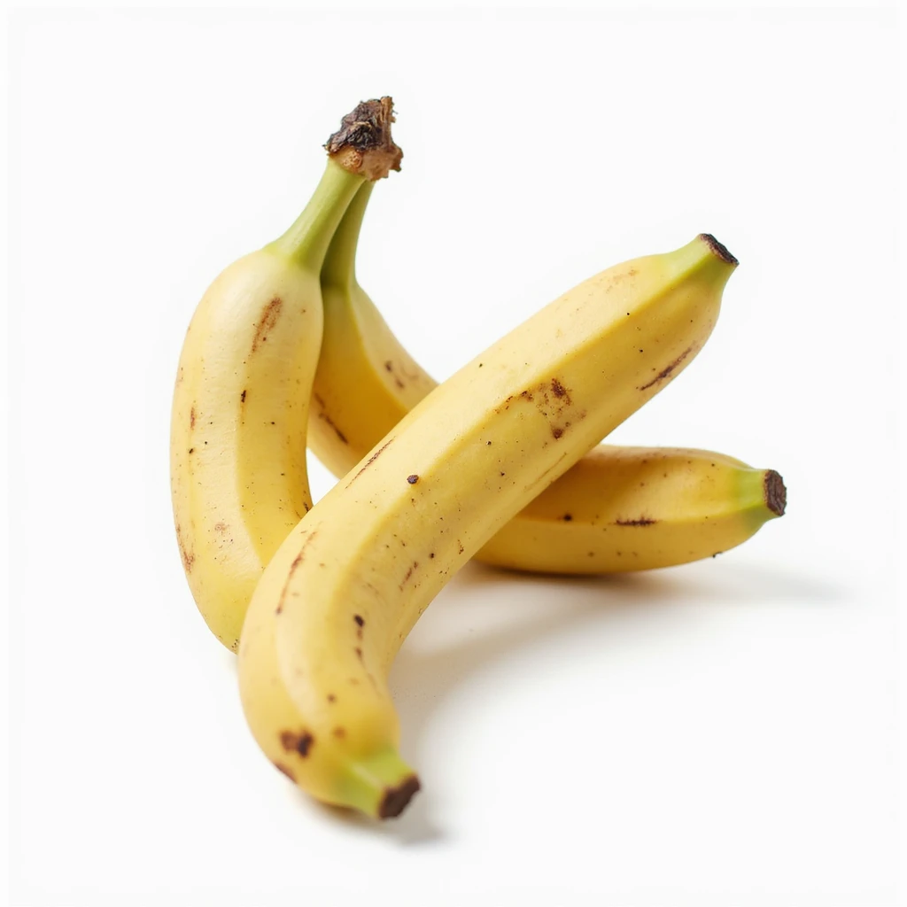 realistic whole banana isolated on white background, natural details, slightly top view emoji