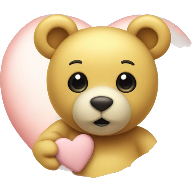 A pastel yellow heart with a cute teddy bear in the corner of the said heart emoji