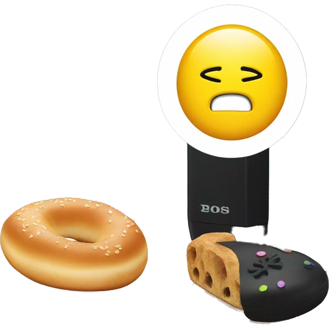 ps5 on a desk next to a bagel with lochs emoji