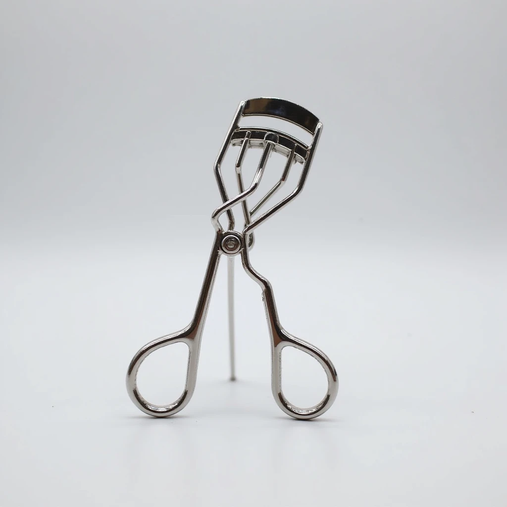 silver eyelash curler, realistic metallic shine, simple background emoji