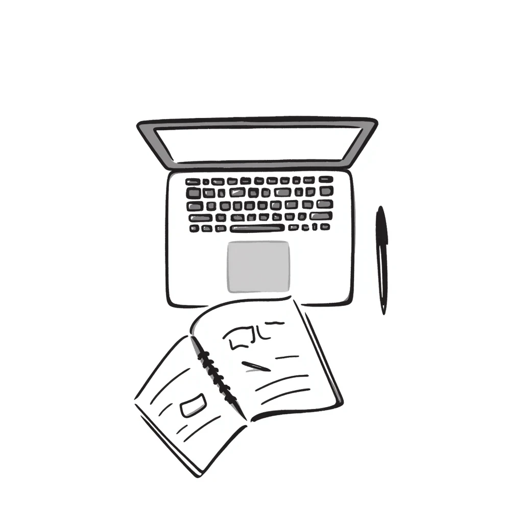 top view of a MacBook and a notebook with a pen nearby, notebook with visible notes emoji