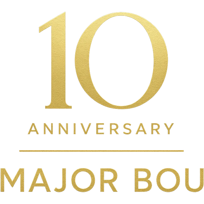 Elegant 10th anniversary logo for Major Bou with gold accents and a modern sans-serif font emoji