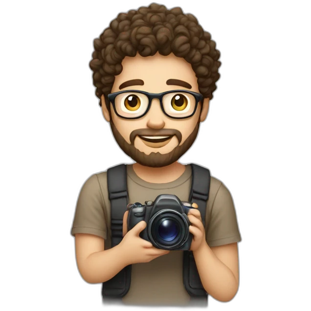 young white guy with dark brown curly hair round face and goatee beard nerd tshirt holding camera emoji