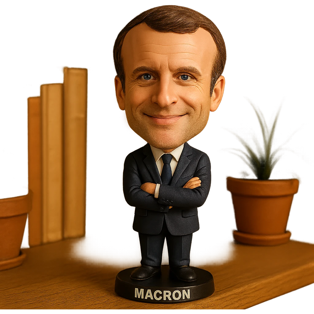 bobblehead style figure of Emmanuel Macron, French president, suit and tie, oversized head, confident smile emoji