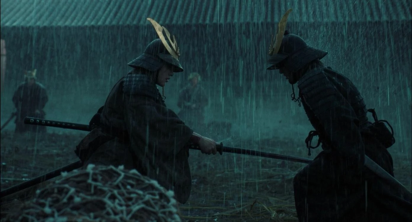 A cinematic scane from 1185, Wide shot of a two japan samurai face to face ready to fight during rain, deph composition, tense atmosphere, captured by by arri alexa, film directed by wes anderson emoji