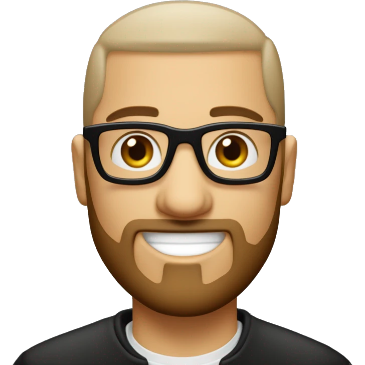 Un homme blanc avec une barbe noir rasé et des cheveux noir en buzz cut avec des yeux marron et des lunette fine et ronde qui travail sur un macbook emoji
