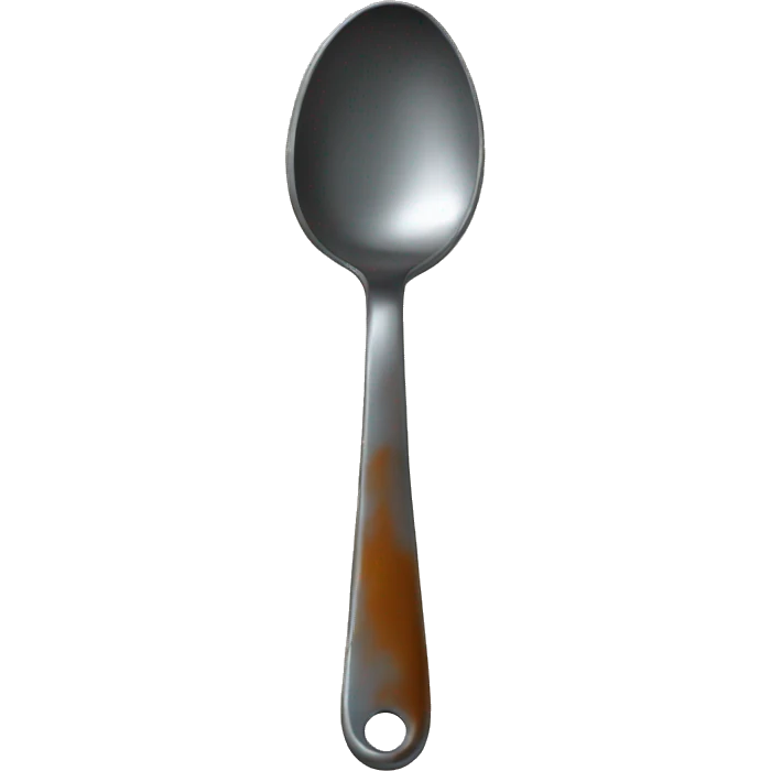 a metal spoon with rust on the bottom emoji