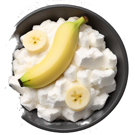 Cottage cheese in a bowl with banana slices as a topping emoji