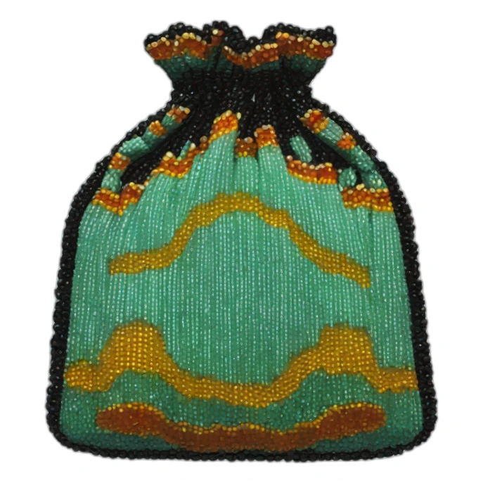 hand holding a beaded bag sticker