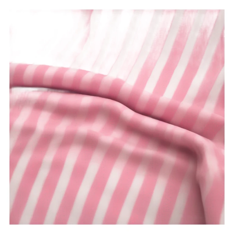 A pink with white stripes blanket  sticker