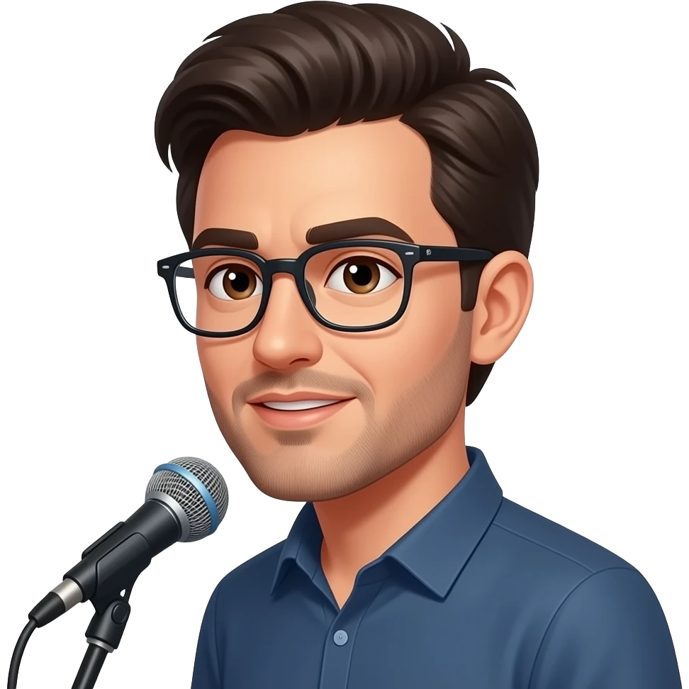 Парень лет 30, темноволосый, с карими глазами, в очках, с короткой бородой, которая проходит вдоль линии подбородка и соединяется в маленькую полоску под нижней губой и короткими усами но они не соеденены с бородой, щёки выбриты, со средней длиной волос , стоит в профиль и говорит что-то в микрофон emoji