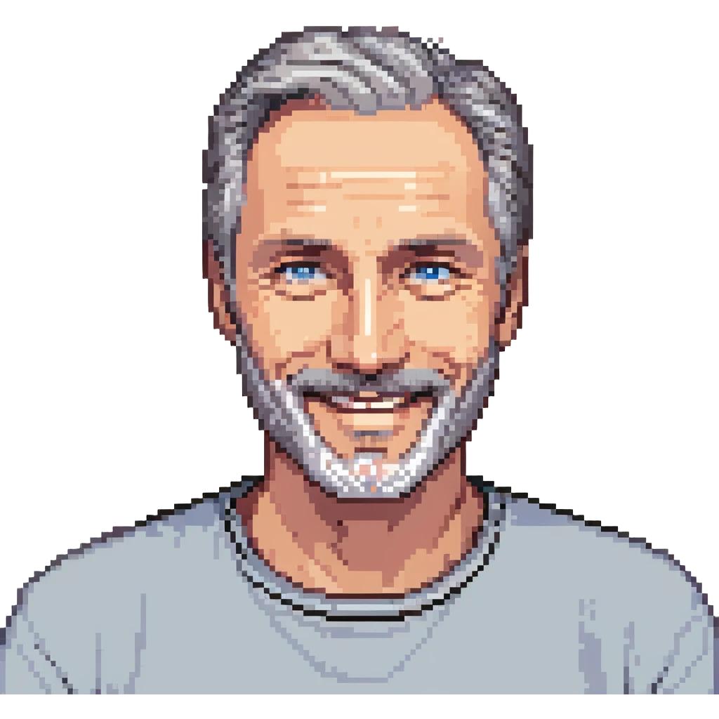 A middle-aged man with a medium black and gray beard, short dark hair cut to the scalp on the sides and combed back on top, blue eyes, smiling emoji
