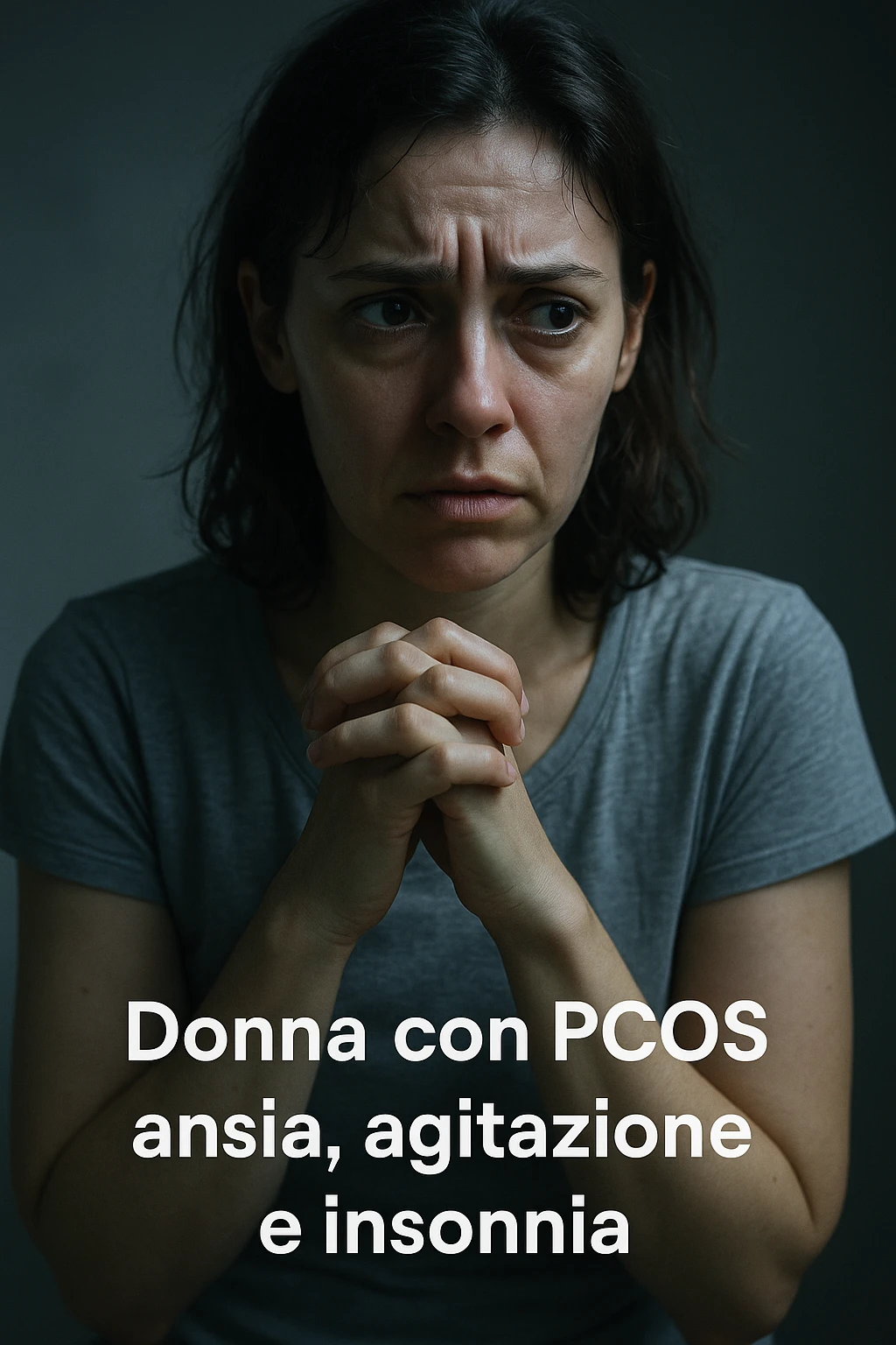vertical realistic cinematic image of a woman with PCOS showing signs of anxiety, agitation, and insomnia. Tense look, nervous posture, eyes marked by tiredness, clinical dramatic lighting, Italian captions, aspect ratio 2:3 emoji