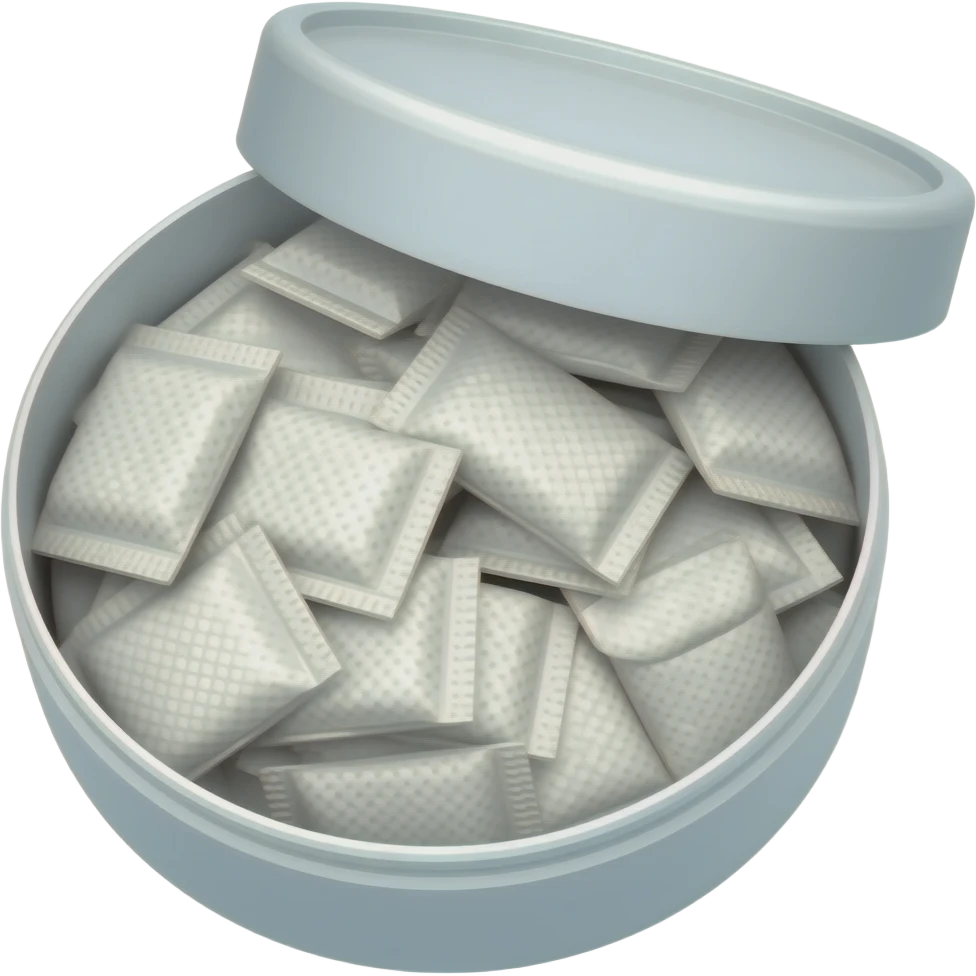 An open white snus container (small round plastic snus box, not a metal can), viewed from a slightly top-down angle. Inside are many small white nicotine pouches. The pouches are rectangular, soft, and slightly wrinkled, overlapping each other and stacked irregularly. emoji