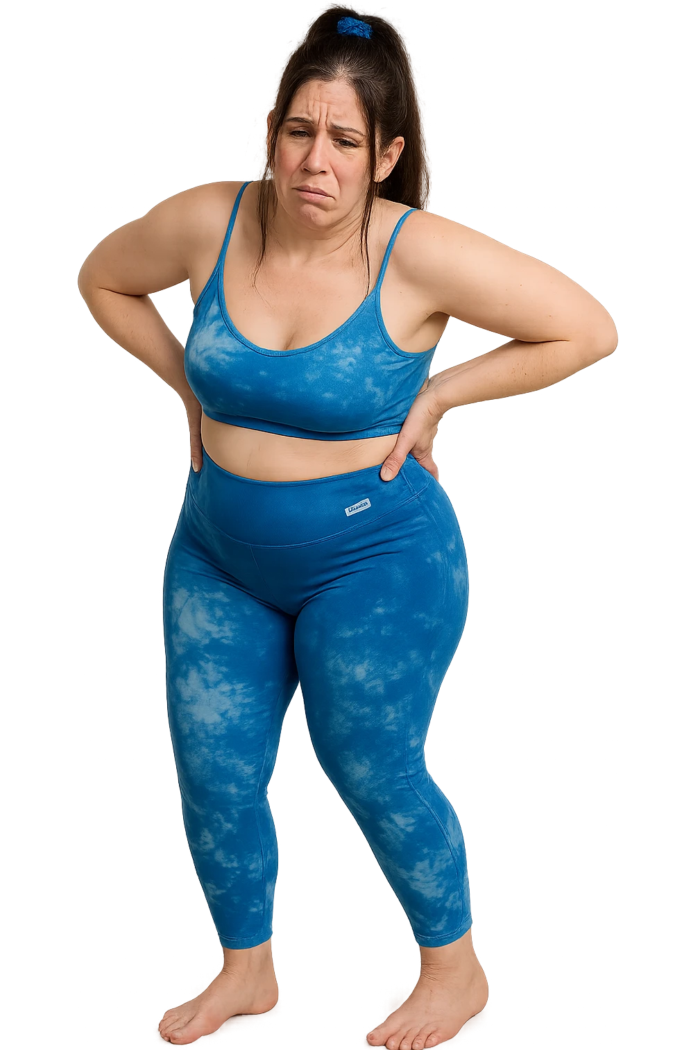 a woman in her 30s  holding her lower back with a pained expression. Subtle visual cues, like uneven shoulders or hips, hint at postural asymmetry. symbolizing chronic pain over the years. vista anatomicamente non farla troppo grassa emoji