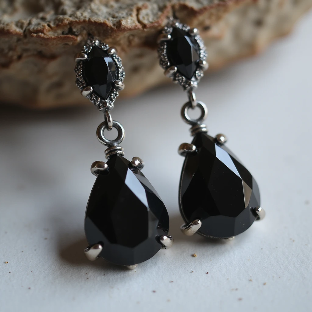 realistic goth earrings, black crystal teardrop, faceted gemstone, shimmering gothic emoji