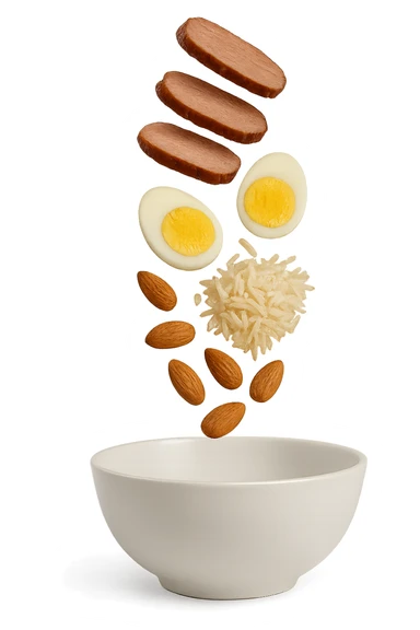 bowl bianca in cui cadono verticalmente fettine di carne, uova sode, mandorle e riso basmati sticker