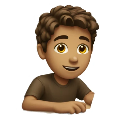 Brown haired boy at desk with a laptop sticker